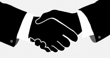 Two people shaking hands